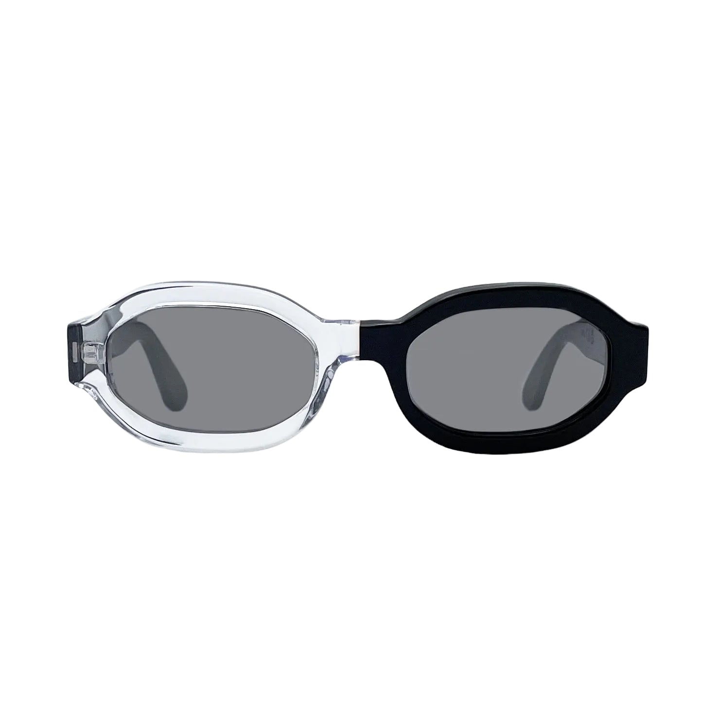Oversized octagonal sunglasses with a clear transparent frame on the left and a  black frame on the right, featuring dark gray mirror lenses, shown against a plain white background.