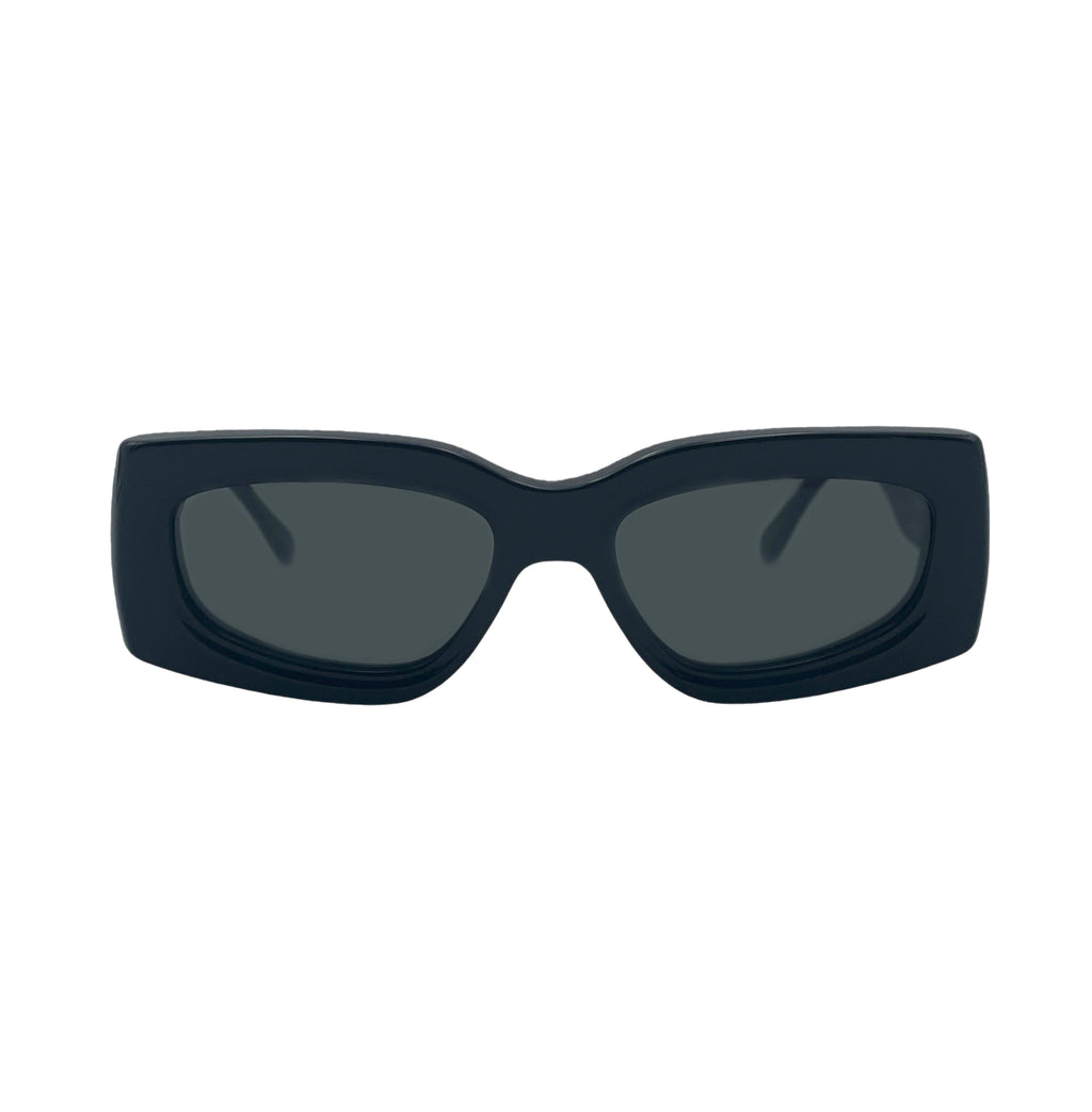 A pair of oversized square sunglasses with a thick matte black frame and dark gray lenses, shown against a plain white background.