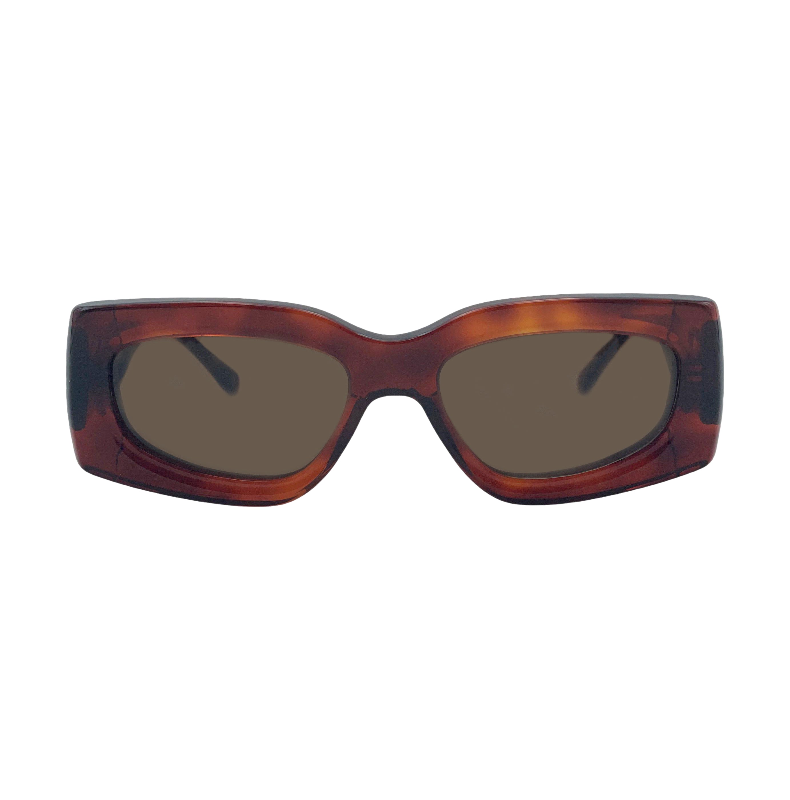 Oversized square sunglasses with a translucent tortoiseshell frame in brown and amber tones, featuring dark brown tinted lenses.