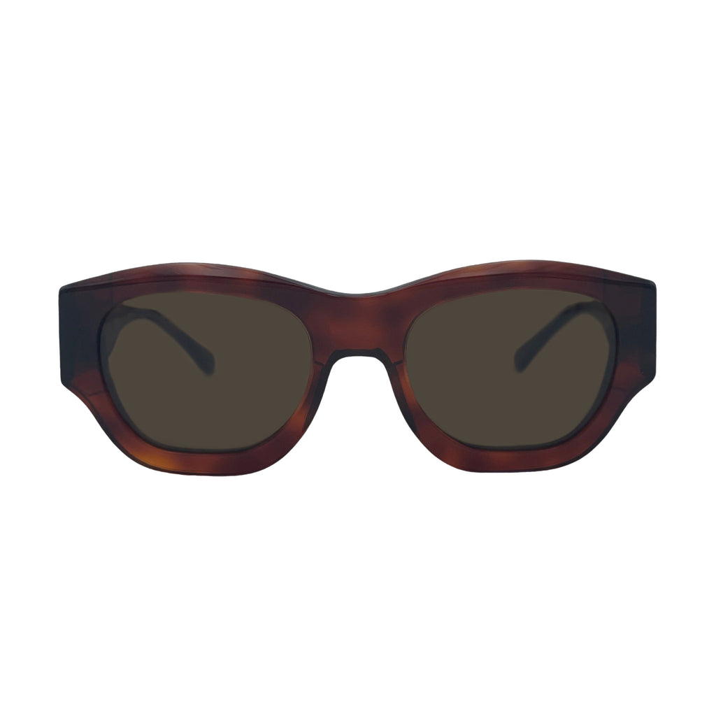 Oversized cat-eye sunglasses with a dark brown tortoiseshell frame and dark tinted lenses, shown against a plain white background.