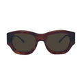 Oversized cat-eye sunglasses with a dark brown tortoiseshell frame and dark tinted lenses, shown against a plain white background.