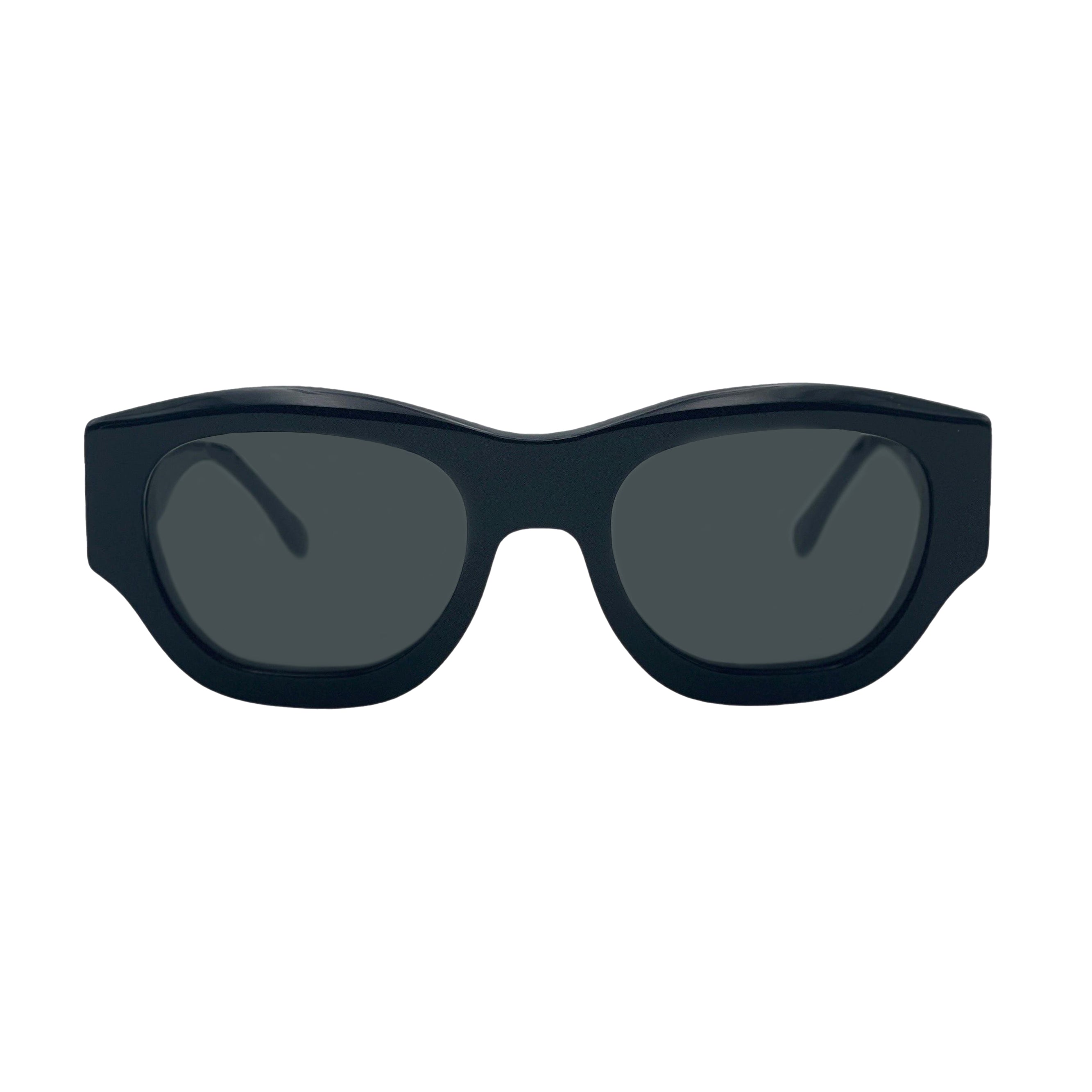 A pair of chunky, oversized square sunglasses with a matte black frame and dark gray lenses, shown from a front-facing perspective on a solid white background.