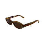 Octagonal sunglasses with a brown and green tortoiseshell acetate frame and dark brown lenses, shown on a plain white background.